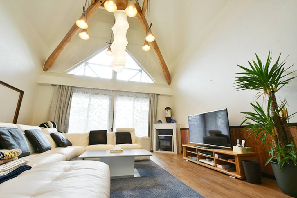Spacious living room with heaters