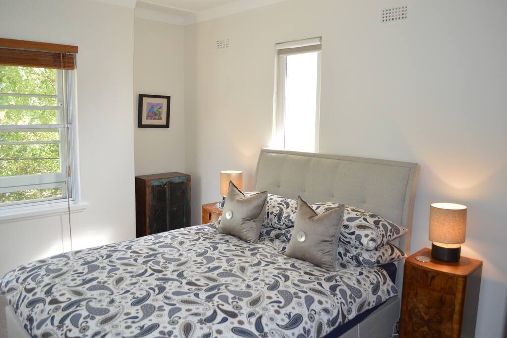 Bedroom with Queen Size bed with views to the silver birch in the front yard. Secondary glazing for a silent sleep.