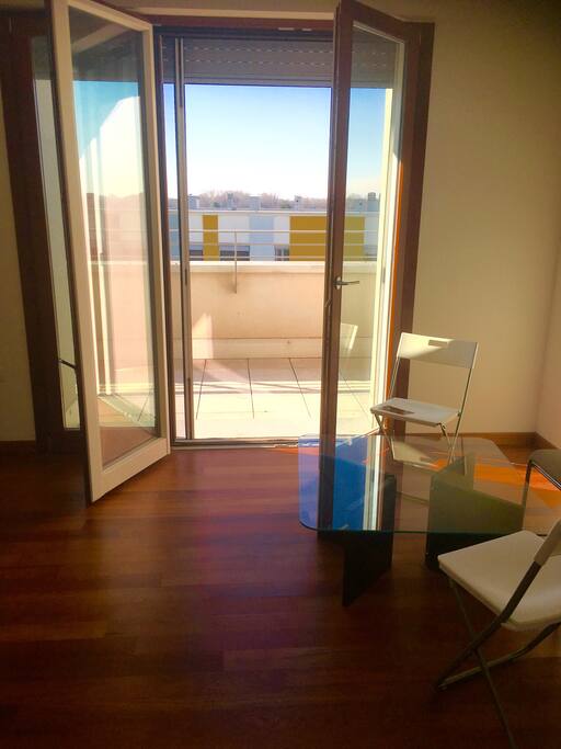 Leaving room with first balcony