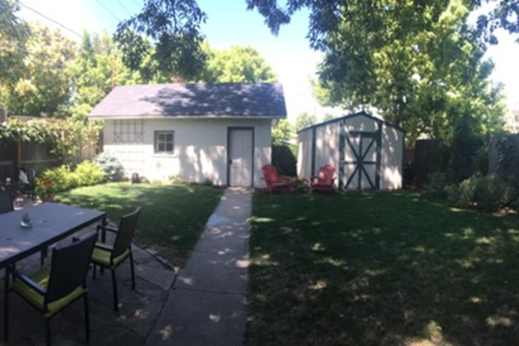 Backyard with BBQ and seating areas
