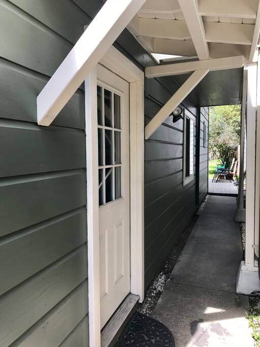 Walkway to the Ground level entrance and into the backyard and patio.