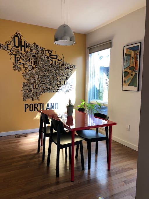 The dining room is to the right when you walk in. The mural (which I made myself!) shows different Portland neighborhoods.