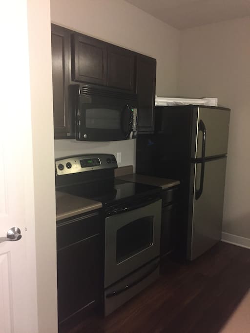 Kitchen with full amenities. Dishwasher included