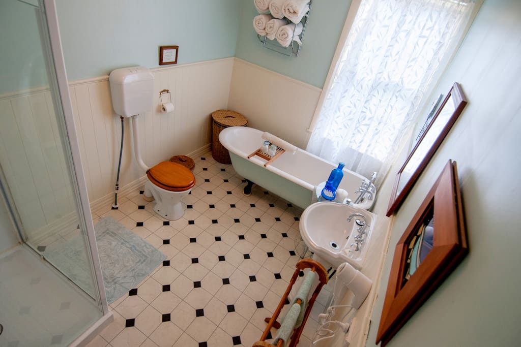 One of the 2 bathrooms shared between 6 heritage rooms