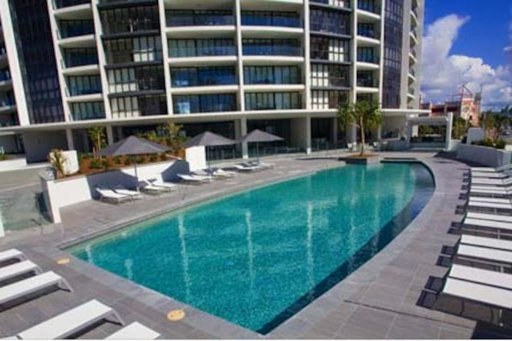 Relax by the resorts pool. Pool towels are provided and are stored in the apartment.