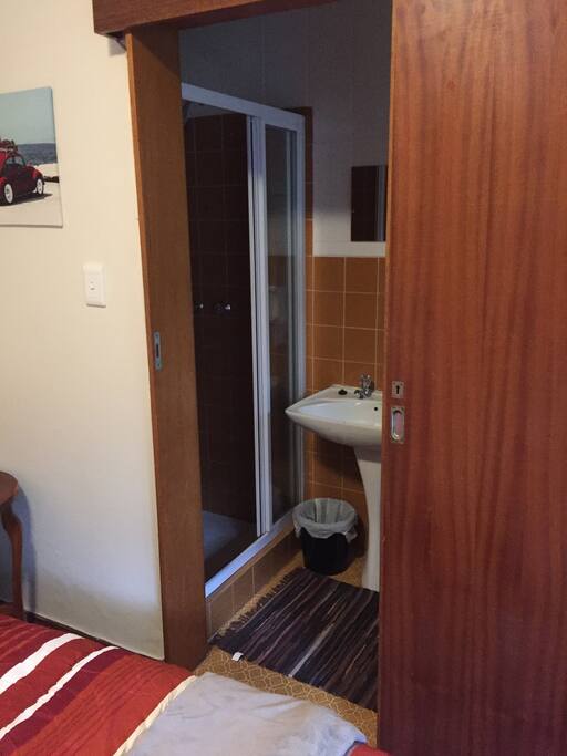 The bathroom with shower.