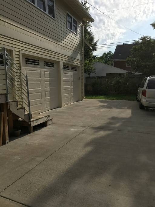 Driveway to the right of the house