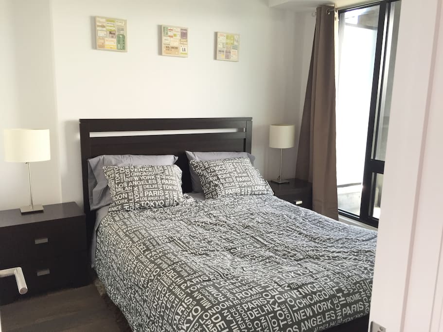 Closed bedroom with queen size bed