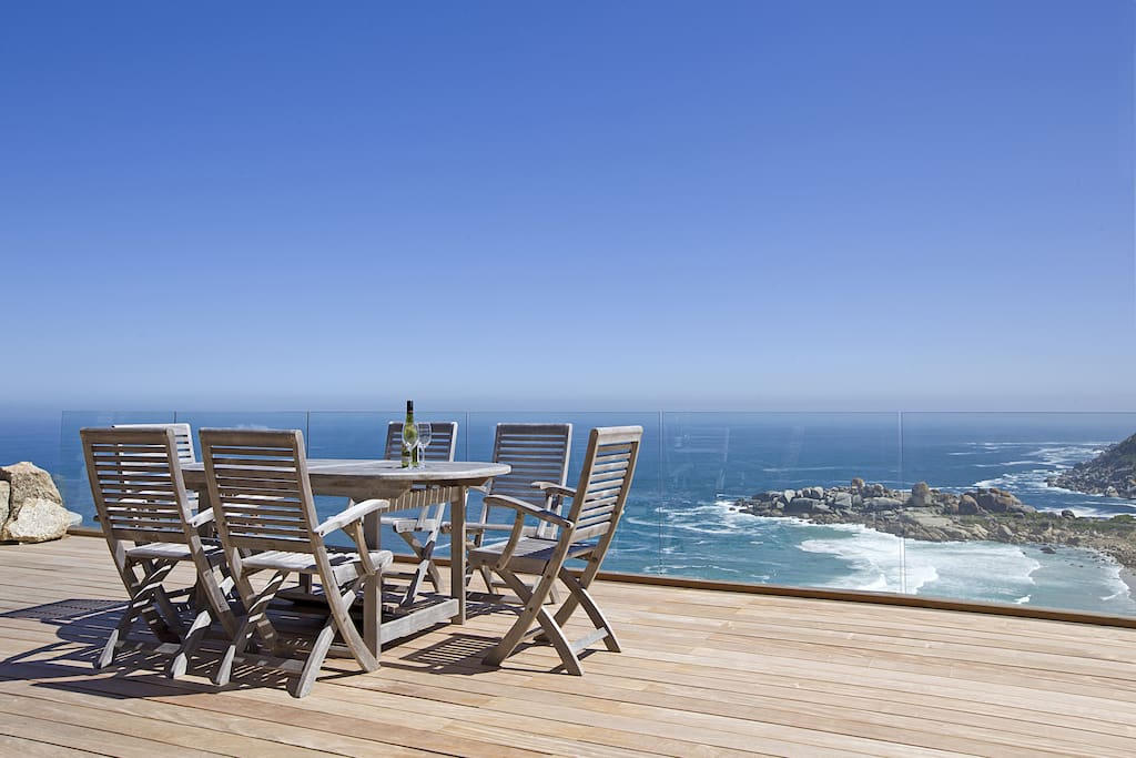A glass of wine with a sea view