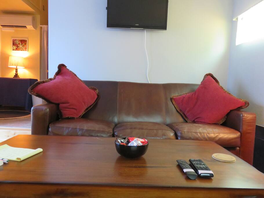Lounge area. TV on the wall does not have cable but has access to Netflix, Hulu, Amazon via Firestick.