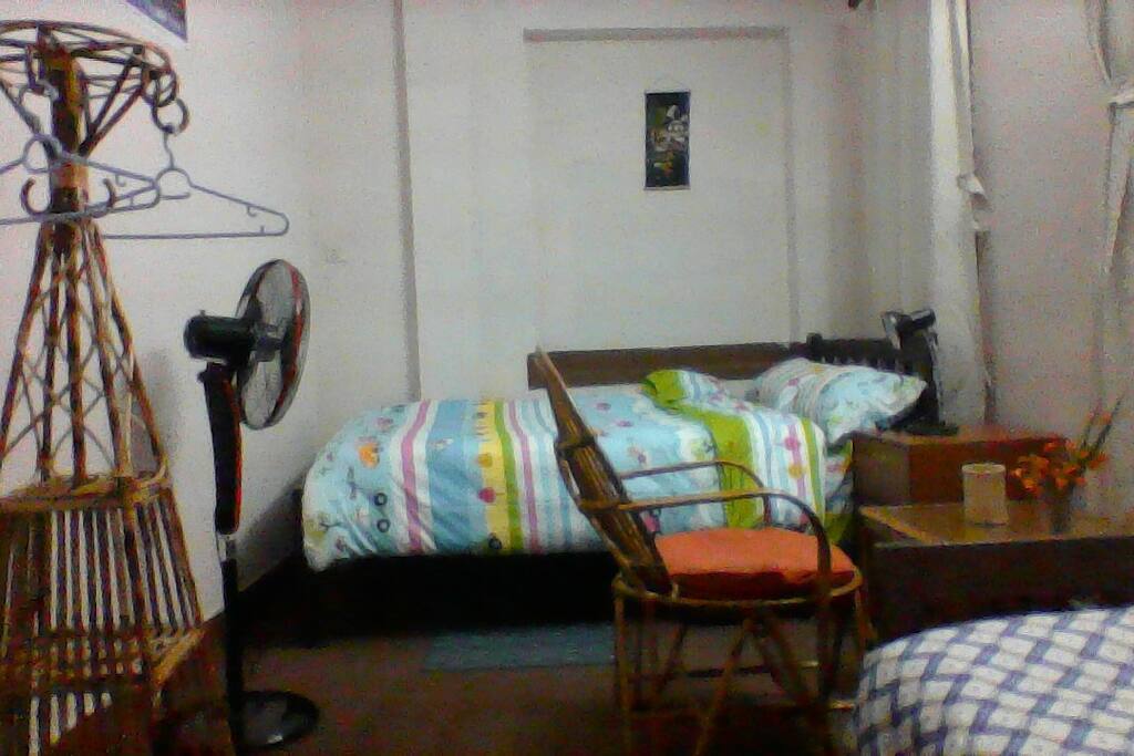 Main bedroom with double and single beds