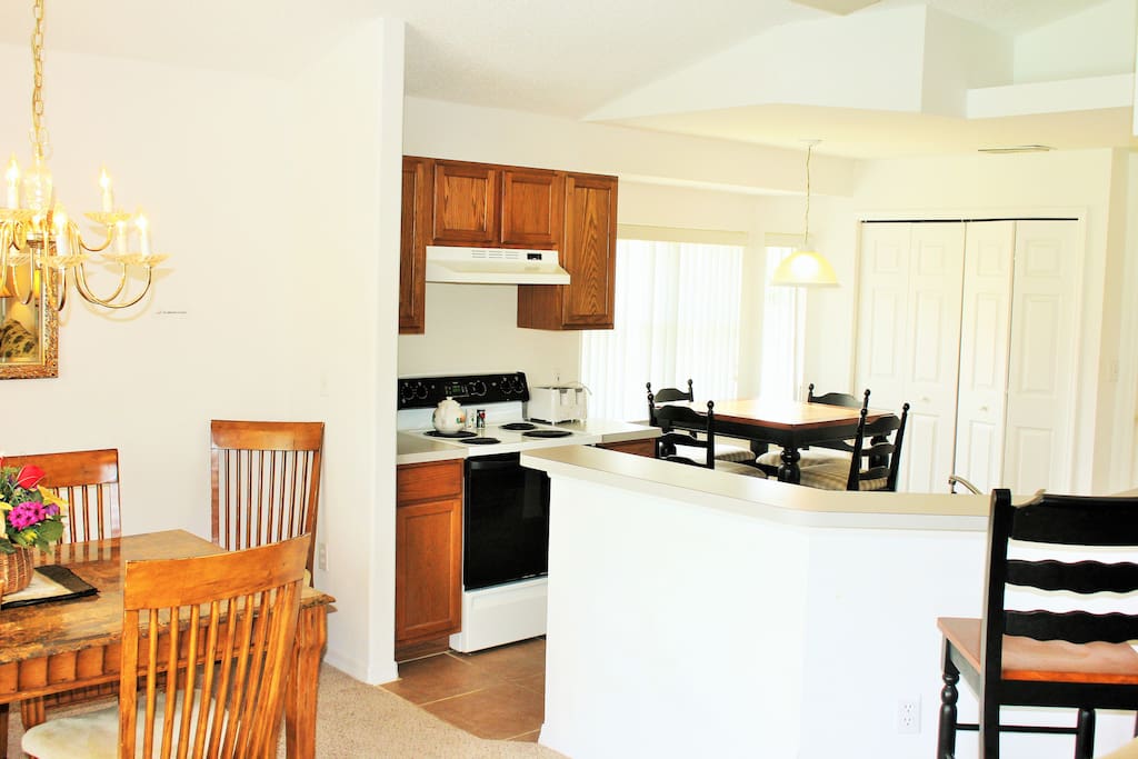 Well-fitted kitchen with breakfast nook and Dining table
