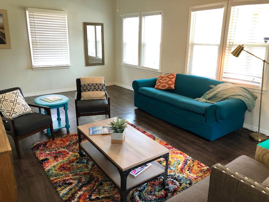 Lots of natural light in the living room. Enjoy all the new surfaces, furniture and fixtures!
