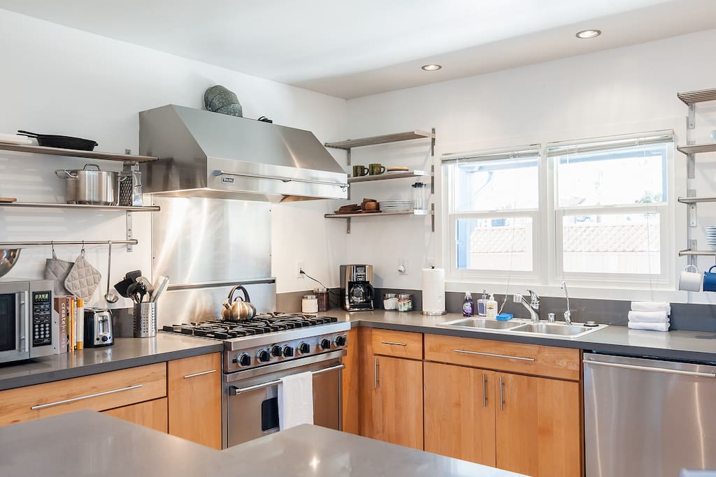 Fully equipped kitchen which includes a modern high end appliances including a Viking Professional Range, Microwave and everything you need to make a good, home cooked meal!