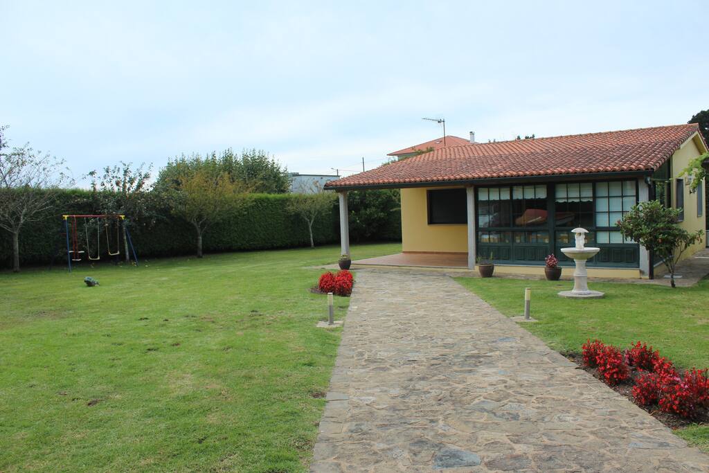 Vivienda y jardin
