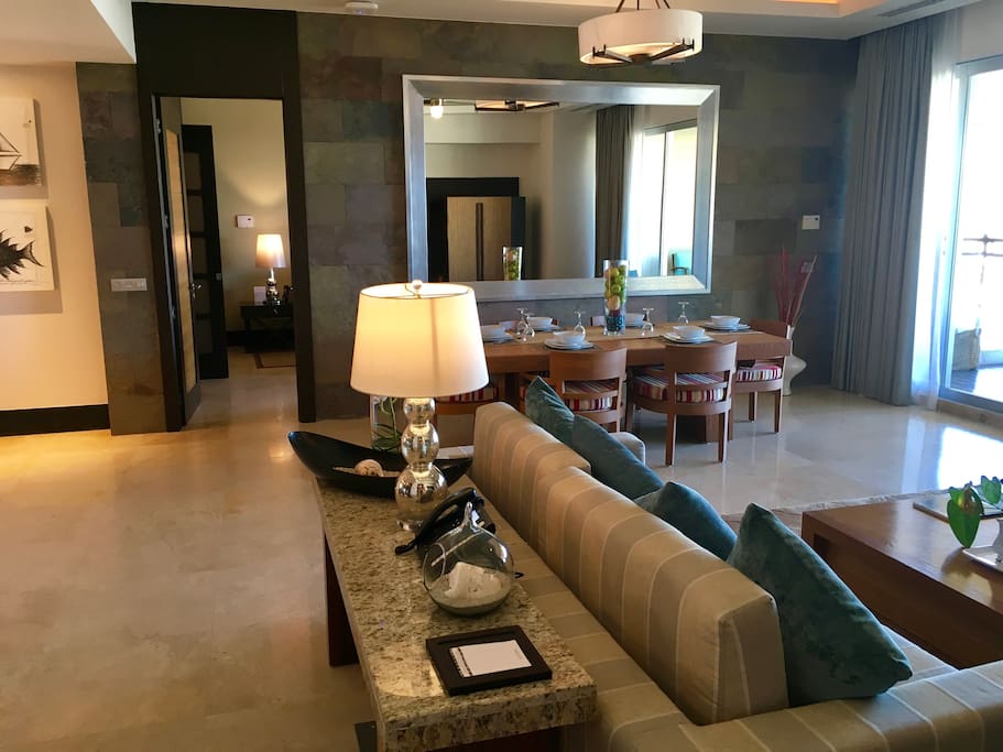 Living and Dining Area with High Celings and Open Lighted Spaces
