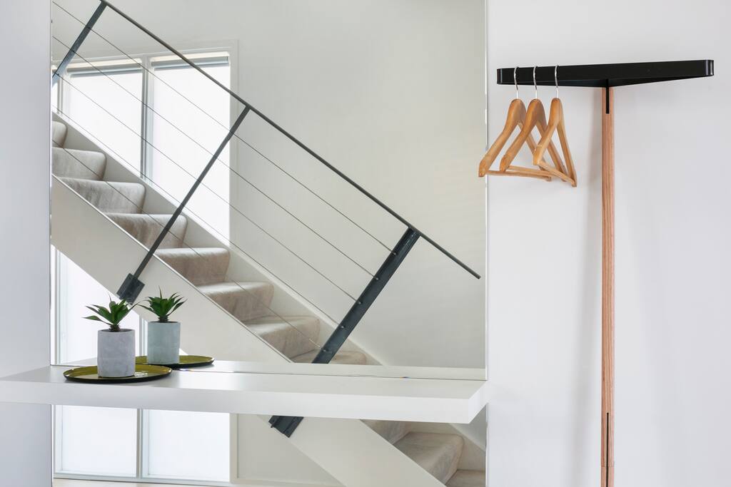 Entry mirror and coat hanger