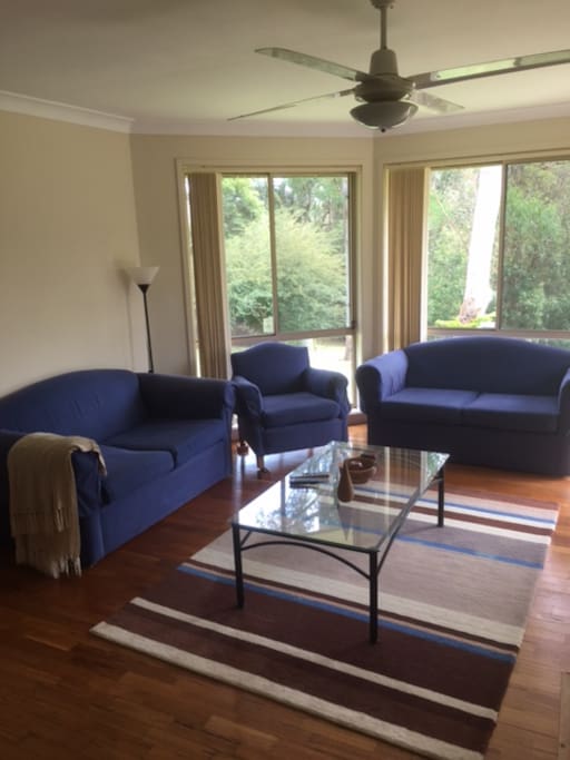 The cosy family room with wood heater