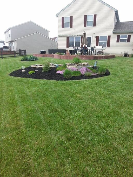 Manicured lawn with pond