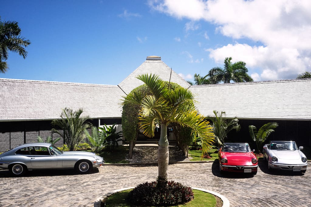 Front exterior with vintage cars