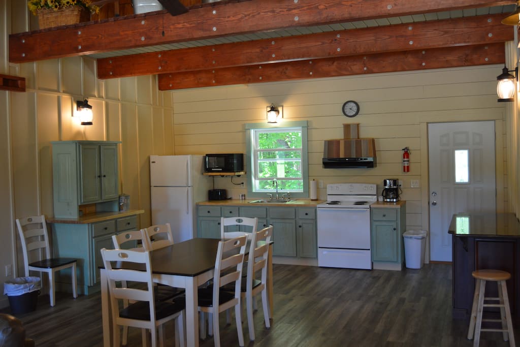 Full kitchen and dining area