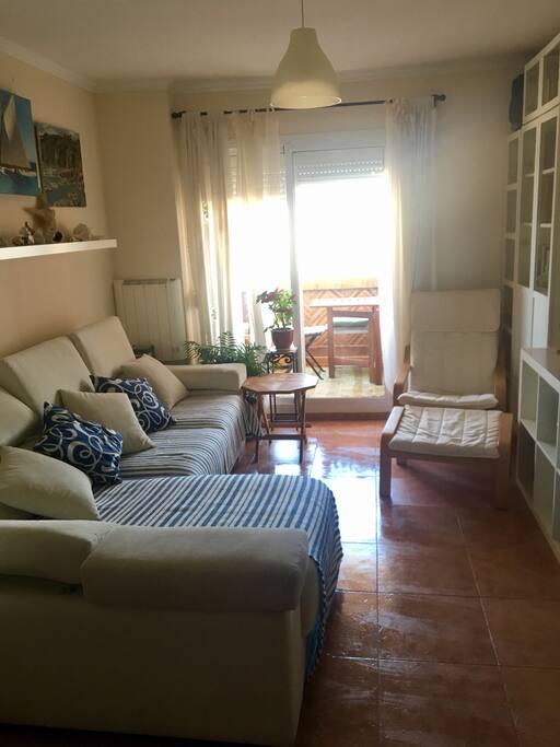 living room with a cover terrace where you can enjoy stunning sunsets
