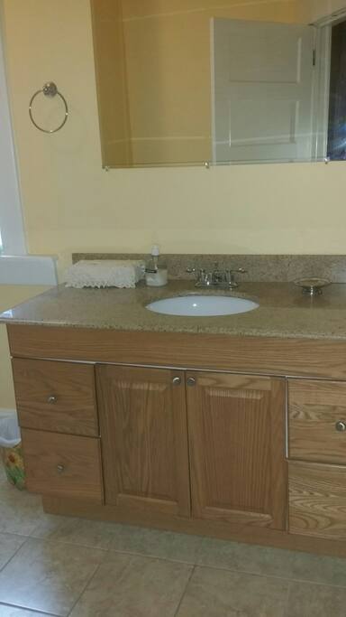 Marble counter top and spacious bathroom