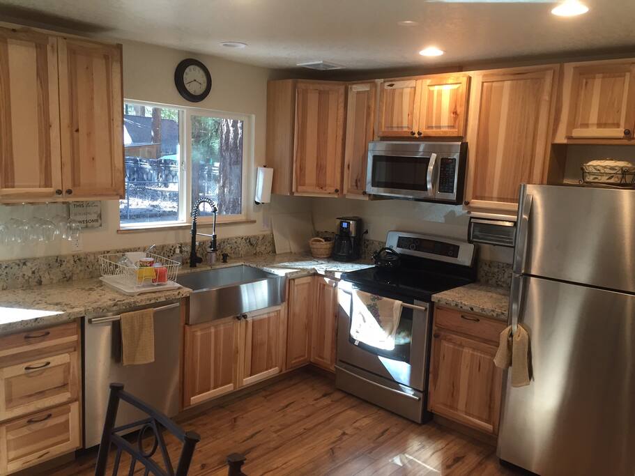 The brand new kitchen with all the amenities stocked with basics like spices.