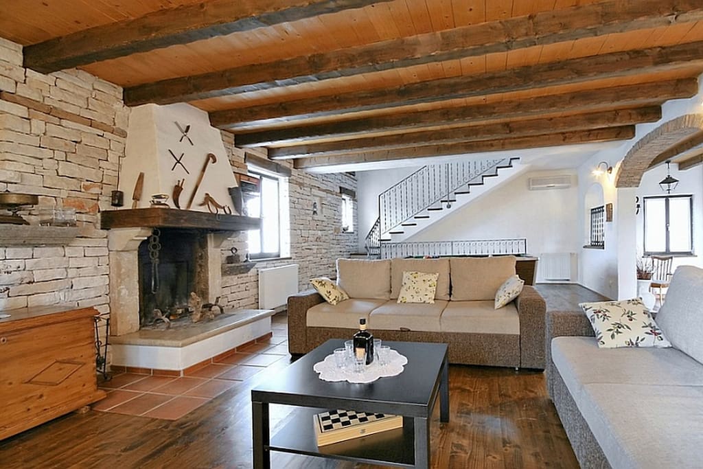 Living room with open fireplace