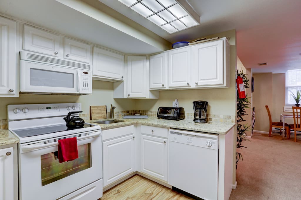 Kitchen is fully equipped with full size range, microwave, dishwasher and all kitchen basics for cooking