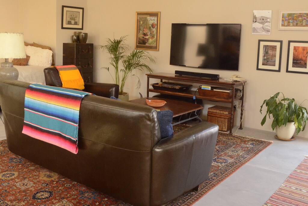 55 inch Flatscreen TV with Satellite.