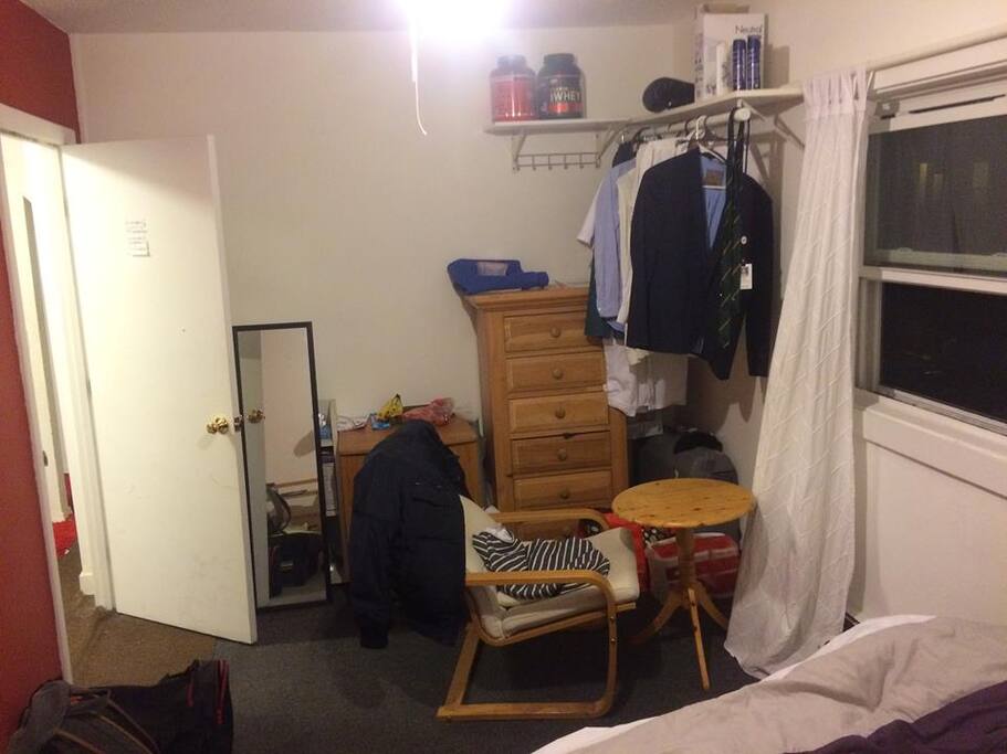 Cloth racks, storage and small table with chair