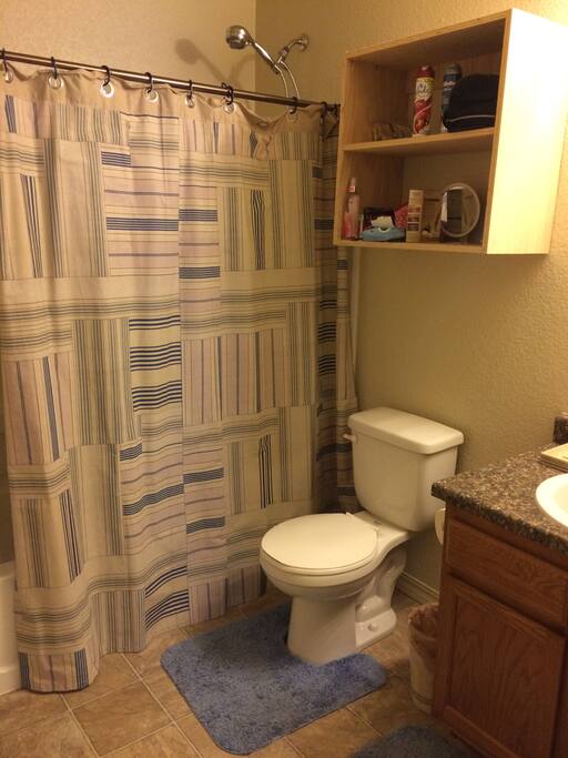 Full bath with comfortable moving around space.