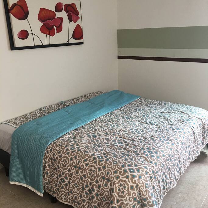 main bedroom with a King size bed.