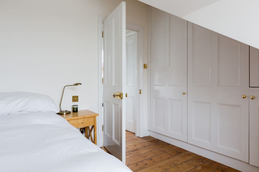 There is a washbasin in the middle cupboard
