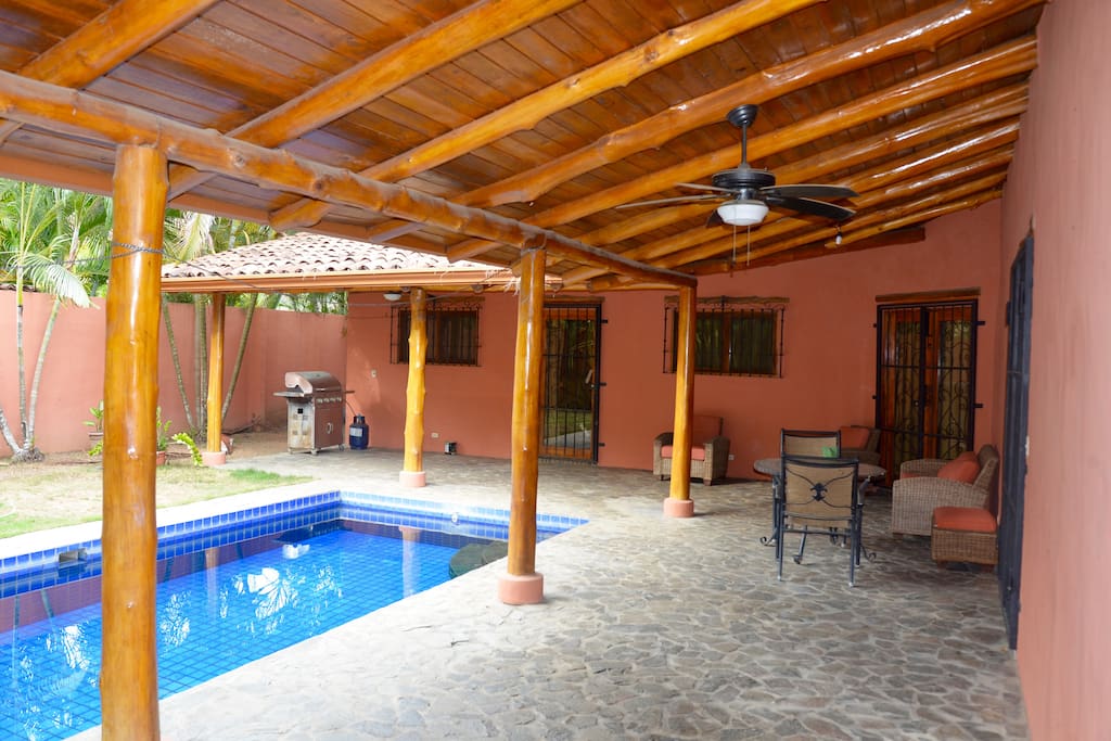 covered patio and pool