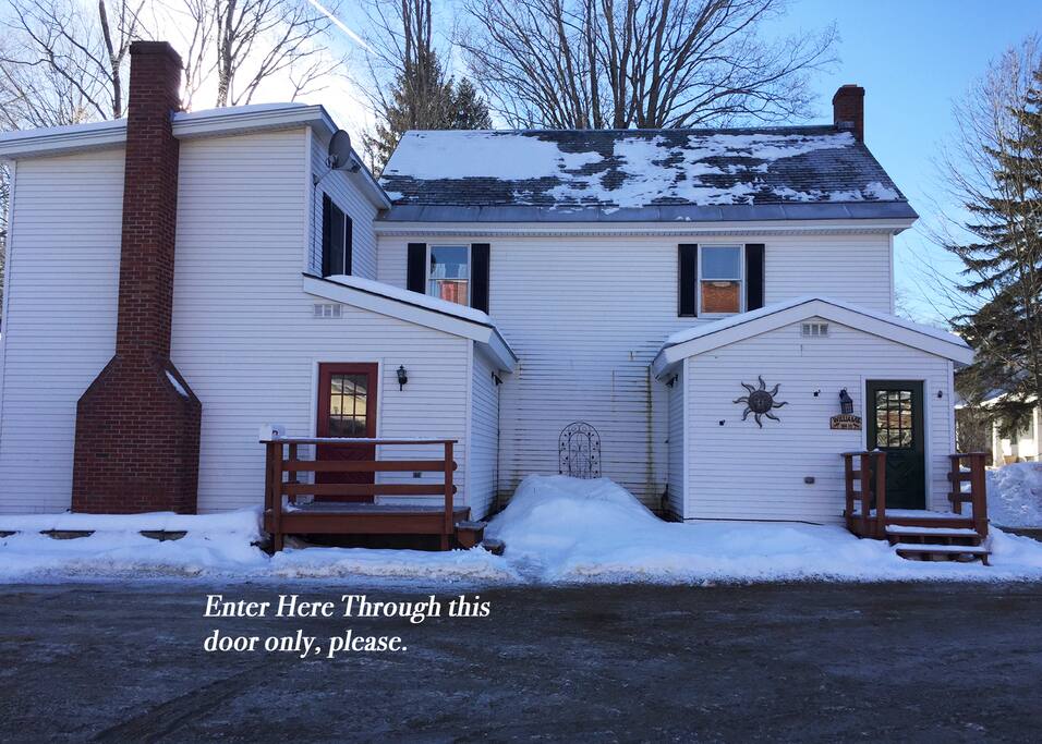front of the house. Enter on left, the right is a private residence.