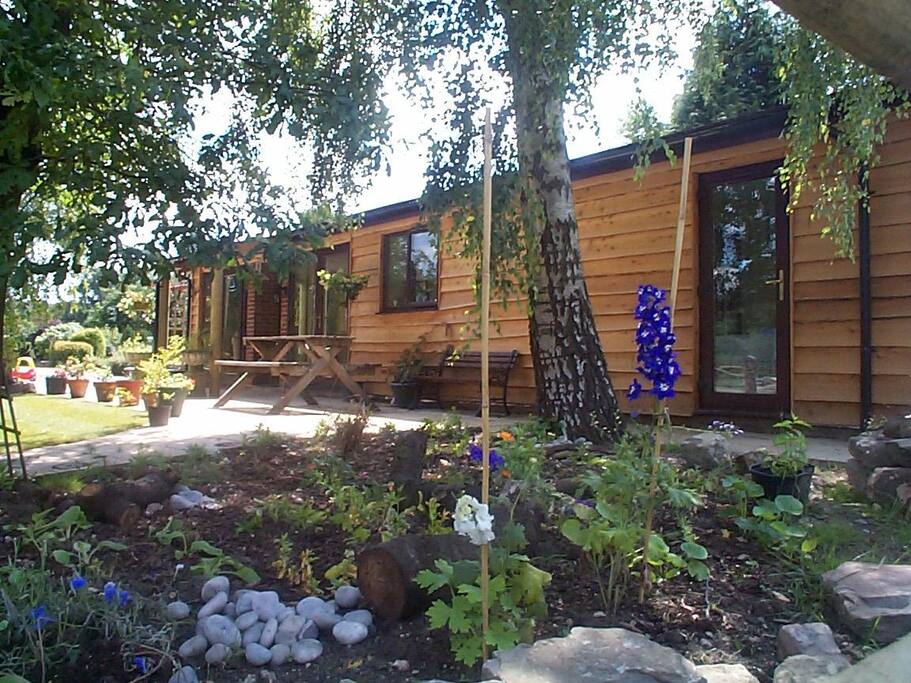 The lodge set in its own private grounds which is situated approximately 15 meters from the lake.