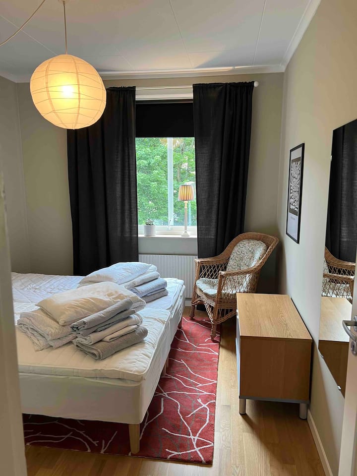 The smaller bedroom with two beds, easy to make a kingsize double or have as two single beds. In the bedroom there’s also a wardrobe for hanging your clothes.