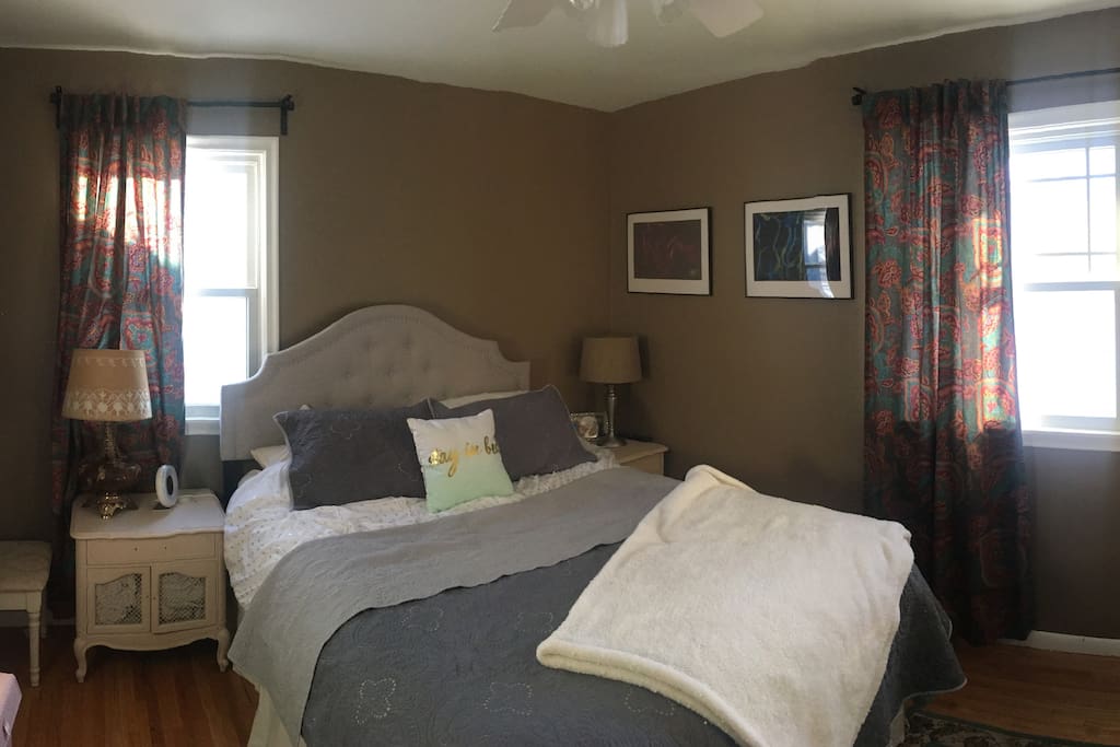 Master bedroom with queen bed and plenty of snuggly blankets