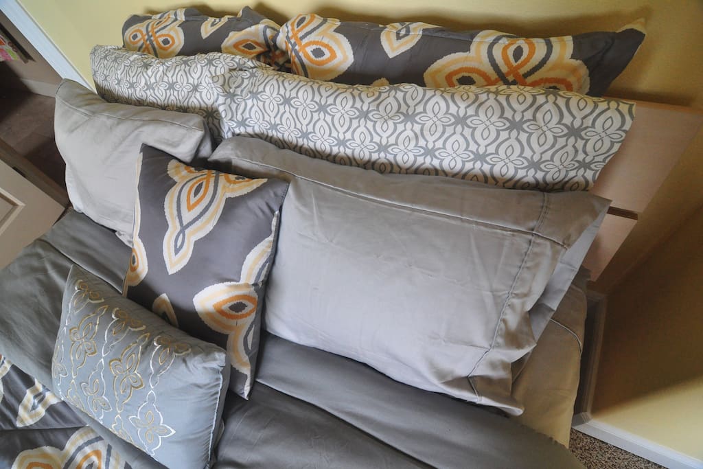 Queen size extra thick pillow top mattress and plenty of comfy pillows!