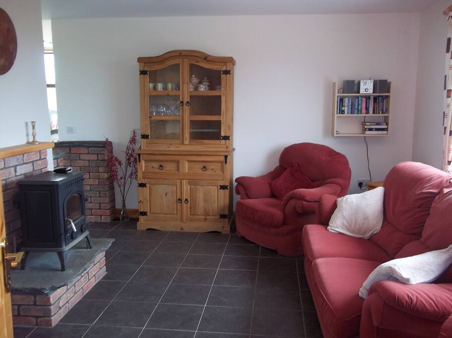 Living area with TV, DVD, Satellite Channels and Irish Channels, CD/Radio and wood burning stove