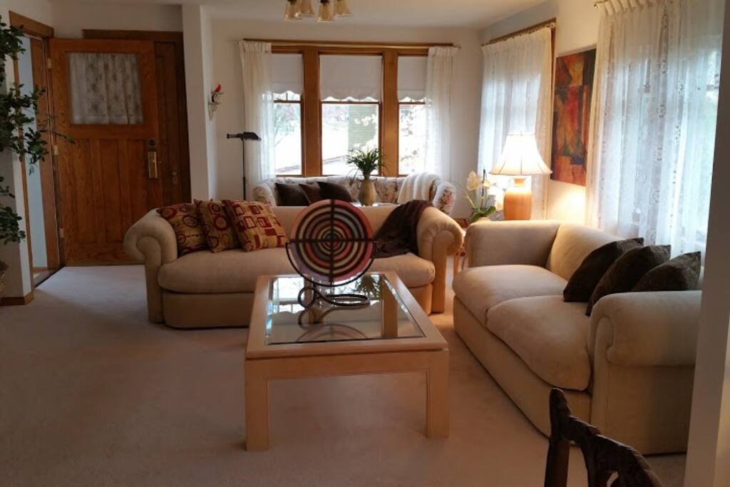View Of The Living Room Bathed In Light