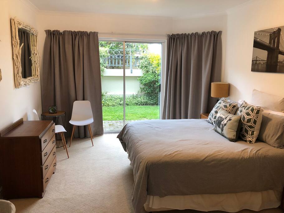 Main bedroom with ensuite bathroom with shower, bath, basin and toilet