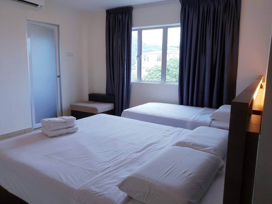 Grand Superior Room with window, suitable for 3 guests.
