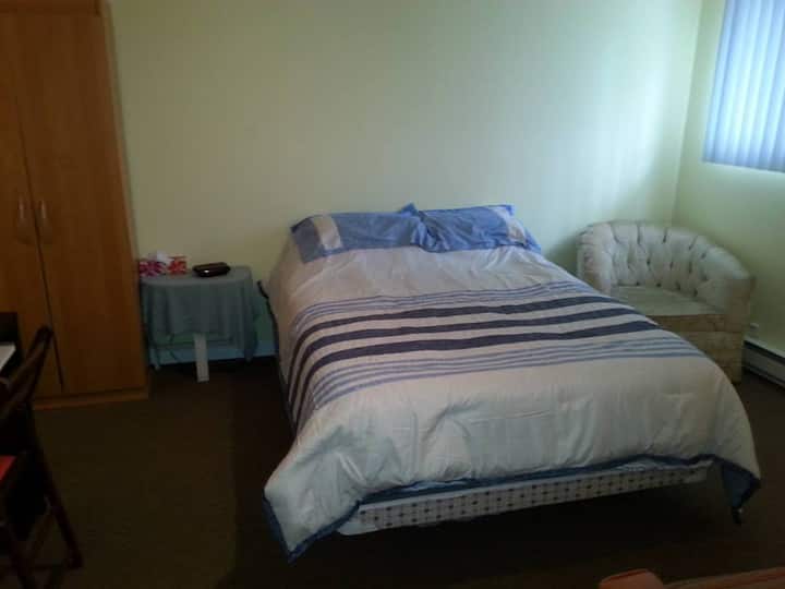 second bedroom with a double bed + sofa bed . 