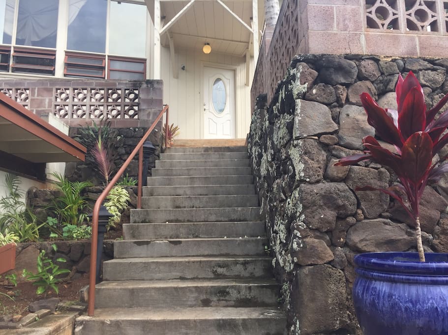 Entry way with 10 steps up.