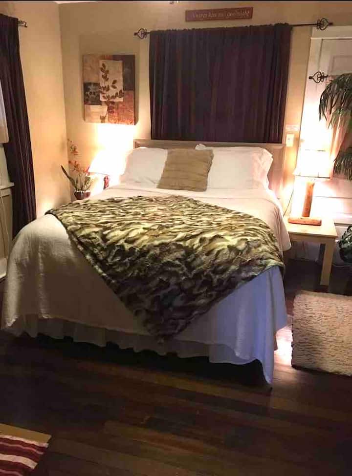 Another picture of master bedroom upstairs with queen bed