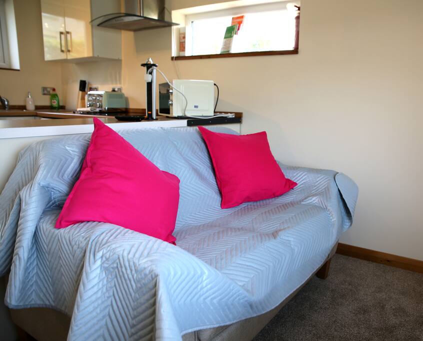 Relax on the sofa with free Wifi and plenty of electric sockets