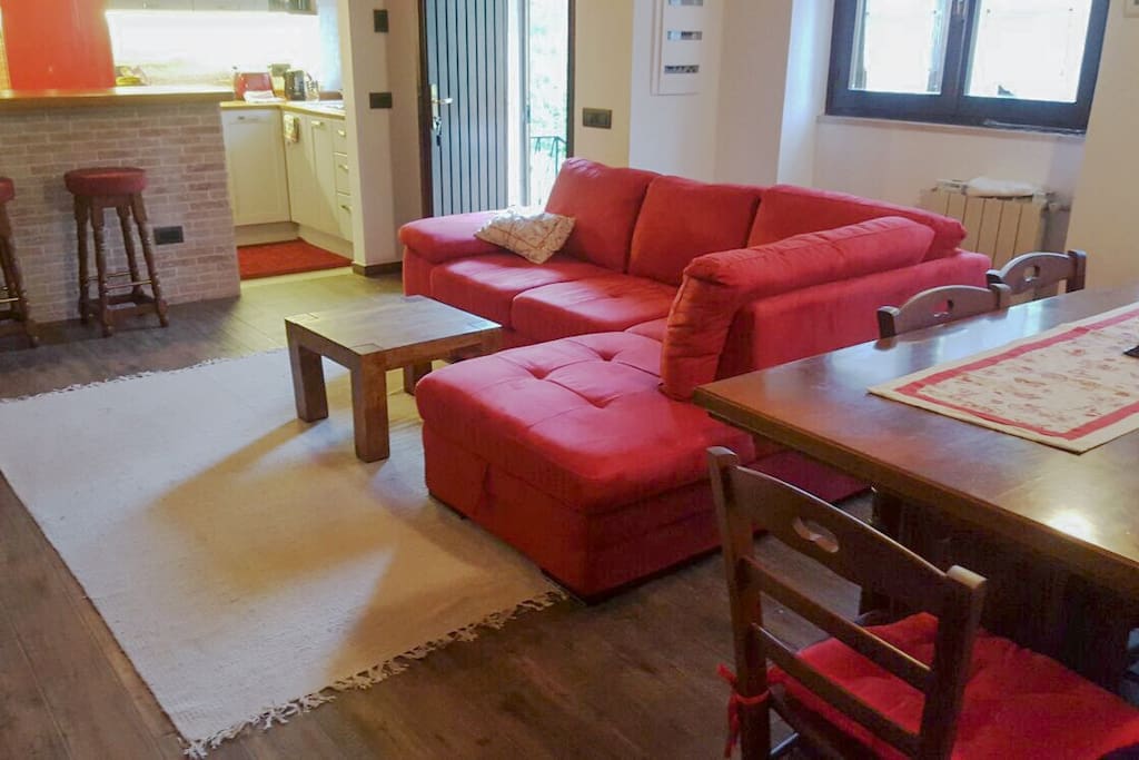 Front room, sofa bed, large dinner table